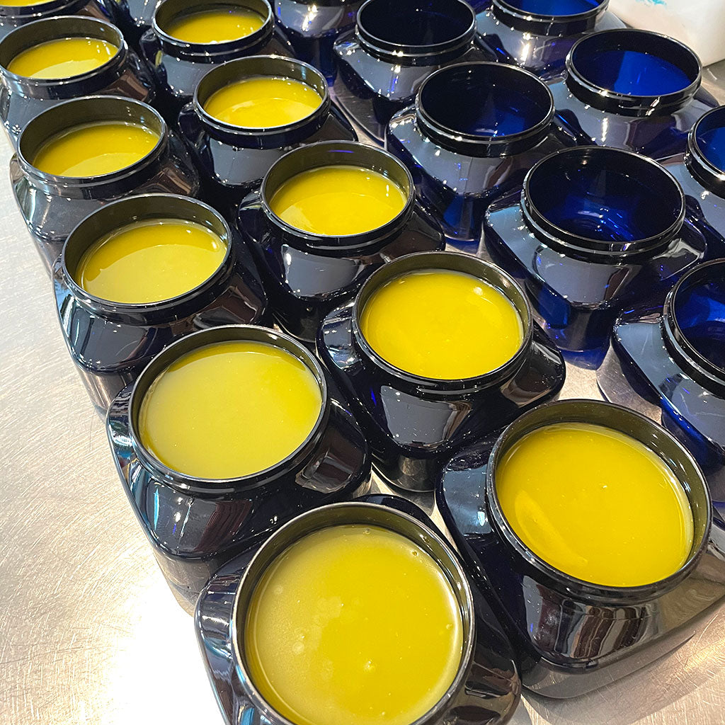 production photo of nourishing balm being made