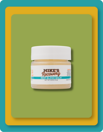 A small jar of Mike's Recovery Rest Blend Balm with a white cap and a white label, centered on a green rounded rectangle with yellow and teal border accents.