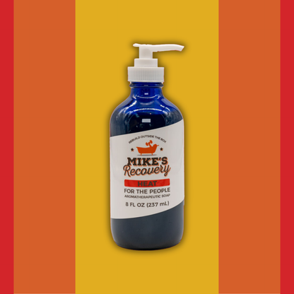 Bottle of Heat aromatherapy soap with scents of black pepper and cinnamon