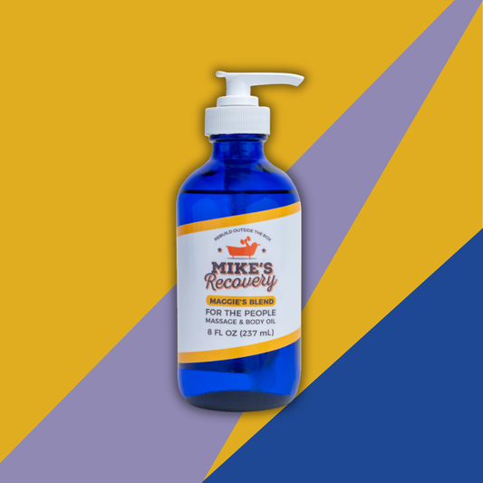 bottle of Mike's Recovery massage body oil in the Maggie's Blend