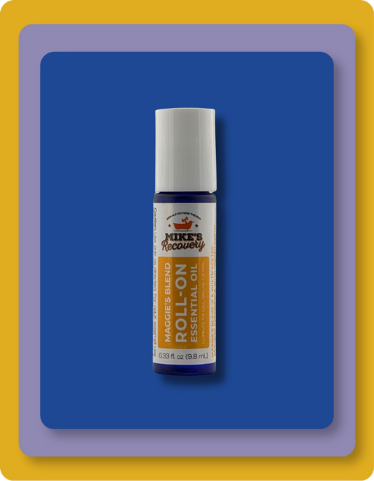 A 10 mL essential oil roll-on bottle from Mike's Recovery, featuring a white cap and a label with a white top half and yellow bottom half, set against a blue background with a purple and yellow frame.
