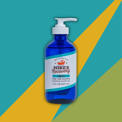 Bottle of Rest blend massage and body oil