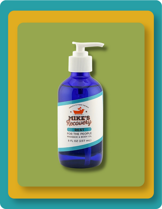 A blue pump bottle of Mike's Recovery Rest massage and body oil, centered on a green background with yellow and teal border frames.